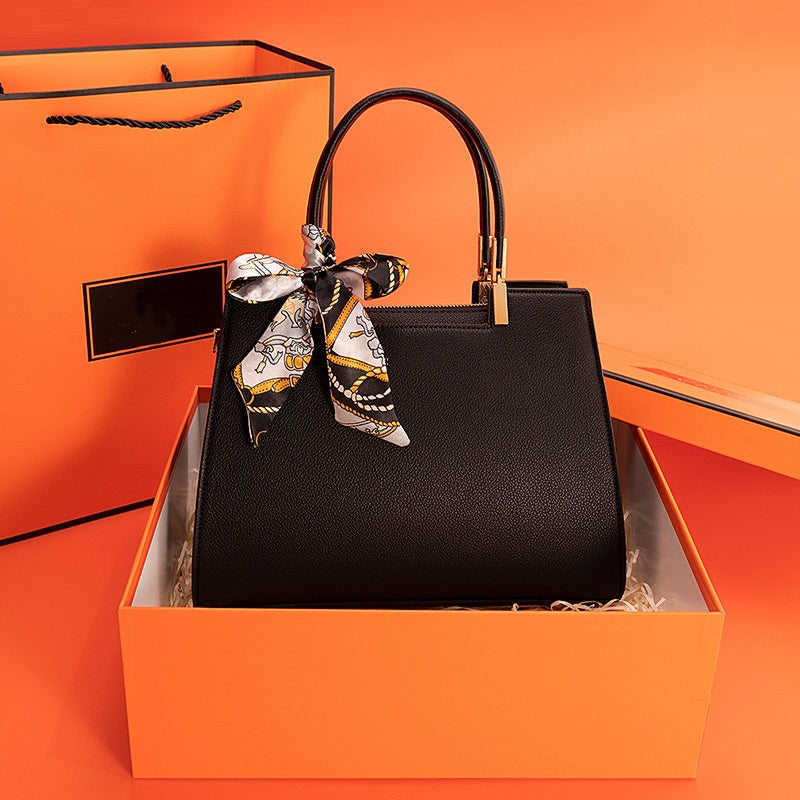 1069-Ladies' minimalist and atmospheric brand commuting handbag