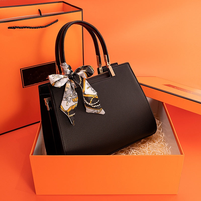 1069-Ladies' minimalist and atmospheric brand commuting handbag