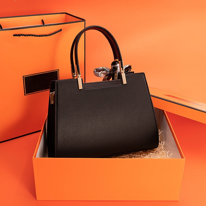 1069-Ladies' minimalist and atmospheric brand commuting handbag